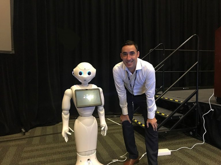 Benjamin Arnulf with pepper from SoftBank at Oracle OpenWorld