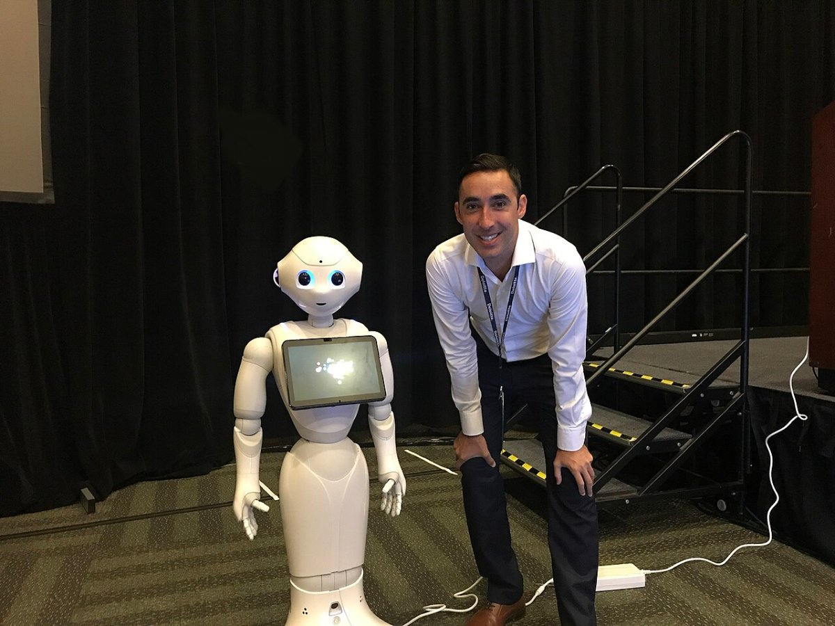 Benjamin Arnulf with pepper from SoftBank at Oracle OpenWorld